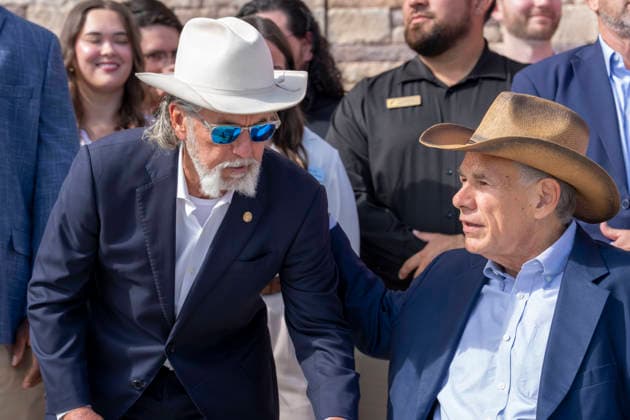 August 12, 2026, San Marcos, Tx, United States: Texas Governor GREG ABBOTT, right is assisted by founder ARCH BEAVER APLIN during the opening of another 76,000 square foot Buc-ee s convenience store in San Marcos, Texas on August 12, 2026. The store features beaver-themed merchandise, lots of food choices and 124 gas pumps. San Marcos United States  - ZUMAd150 20260812_znp_d150_005 Copyright: xBobxDaemmrichx