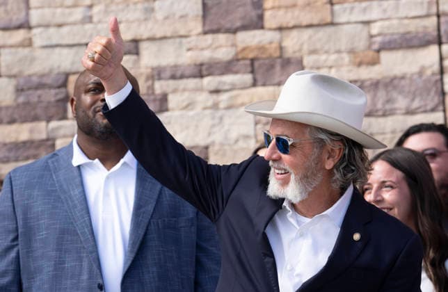 August 12, 2026, San Marcos, Tx, United States: Buc-ee s founder ARCH BEAVER APLIN greets customes in the 74,000 foot Buc-ee s convenience store in San Marcos, Texas after Gov. Greg Abbott (not shown) spoke to the crowd during the opening of Buc-ee s convenience store in San Marcos, Texas on August 12, 2026. The store features beaver-themed merchandise, lots of food choices and 124 gas pumps. San Marcos United States - ZUMAd150 20260812_znp_d150_004 Copyright: xBobxDaemmrichx
