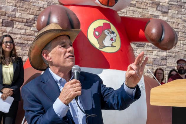 August 12, 2026, San Marcos, Tx, United States: Texas Governor GREG ABBOTT dons a cowboy hat as he speaks during the opening of another 76,000 square foot Buc-ee s convenience store in San Marcos, Texas on August 12, 2026. The store features beaver-themed merchandise, lots of food choices and 124 gas pumps. San Marcos United States - ZUMAd150 20260812_znp_d150_011 Copyright: xBobxDaemmrichx