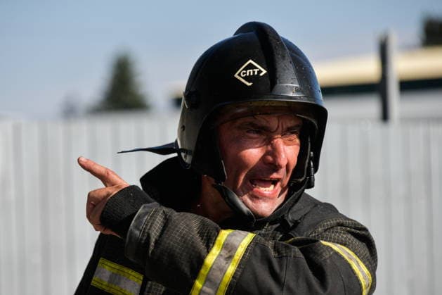 RUSSIA, KRASNODAR REGION - AUGUST 12, 2026: An employee of the Russian Emergencies Minsitry responds to a fire at a warehouse storing plastic products in the village of Lenina, southeast of Krasnodar. The fire covering an area of 2.2 thousand sq m has been contained. Roman Sokolov TASS  96069814