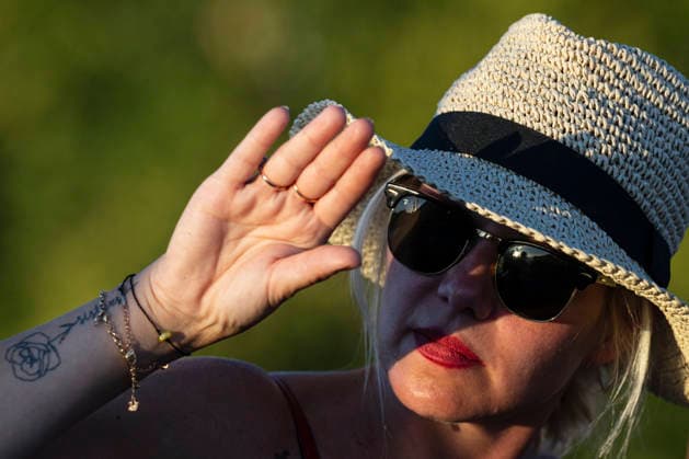 People observe partial solar eclipse in Prague, Czech Republic, August 12, 2026. (CTKxPhoto MichalxKamaryt) CTKPhotoP2026081206791  CTKPhotoP2026081206791