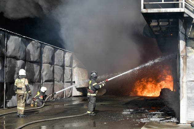 RUSSIA, KRASNODAR REGION - AUGUST 12, 2026: Employees of the Russian Emergencies Minsitry respond to a fire at a warehouse storing plastic products in the village of Lenina, southeast of Krasnodar. The fire covering an area of 2.2 thousand sq m has been contained Russia  - ZUMAt113 20260812_zaa_t113_349 Copyright: xRomanxSokolovx