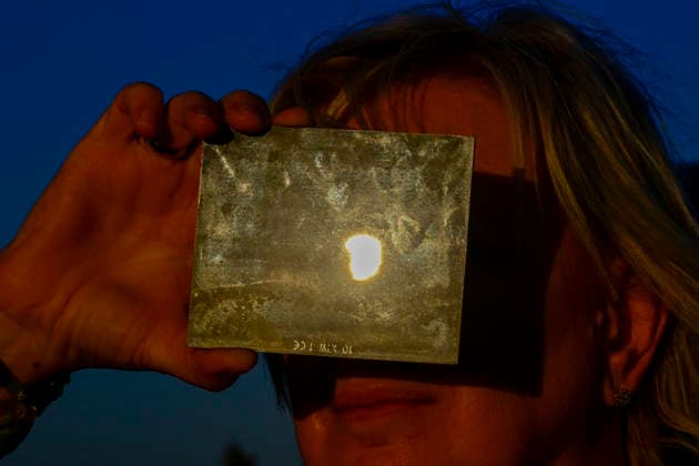 People observe partial solar eclipse in Nedvedice, Brno Region, Czech Republic, August 12, 2026. (CTKxPhoto VaclavxSalek) CTKPhotoP2026081206858  CTKPhotoP2026081206858