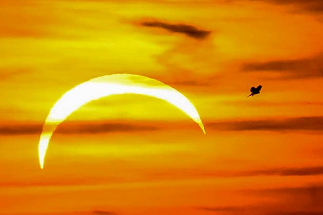 People observe partial solar eclipse in Nedvedice, Brno Region, Czech Republic, August 12, 2026. (CTKxPhoto VaclavxSalek) CTKPhotoP2026081206900  CTKPhotoP2026081206900