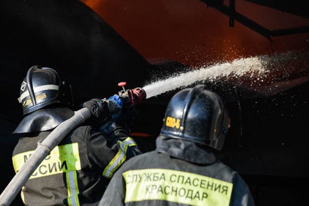 RUSSIA, KRASNODAR REGION - AUGUST 12, 2026: Employees of the Russian Emergencies Minsitry respond to a fire at a warehouse storing plastic products in the village of Lenina, southeast of Krasnodar. The fire covering an area of 2.2 thousand sq m has been contained Russia  - ZUMAt113 20260812_zaa_t113_358 Copyright: xRomanxSokolovx