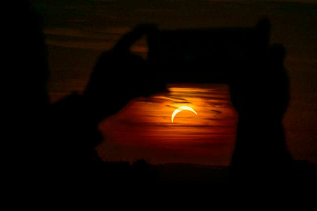 People observe partial solar eclipse in Nedvedice, Brno Region, Czech Republic, August 12, 2026. (CTKxPhoto VaclavxSalek) CTKPhotoP2026081206949  CTKPhotoP2026081206949
