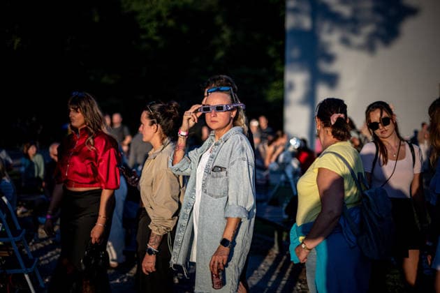 Partial solar eclipse in Czech Republic OSTRAVA, CZECH REPUBLIC - AUGUST 12: People, wearing protective eclipse glasses, observe a partial solar eclipse at Planetarium Ostrava in Ostrava, Czech Republic, on August 12, 2026. Lukas Kabon Anadolu Ostrava Czech Republic. Editorial use only. Please get in touch for any other usage.  Copyright: x2026xAnadoluxLukasxKabonx