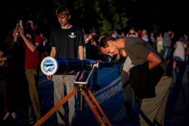Partial solar eclipse in Czech Republic OSTRAVA, CZECH REPUBLIC - AUGUST 12: People use telescopes to observe a partial solar eclipse at an outdoor gathering in Ostrava, Czech Republic, on August 12, 2026. Lukas Kabon Anadolu Ostrava Czech Republic. Editorial use only. Please get in touch for any other usage.  Copyright: x2026xAnadoluxLukasxKabonx