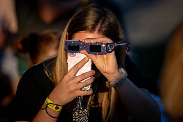 Partial solar eclipse in Czech Republic OSTRAVA, CZECH REPUBLIC - AUGUST 12: People, wearing protective eclipse glasses, observe a partial solar eclipse at Planetarium Ostrava in Ostrava, Czech Republic, on August 12, 2026. Lukas Kabon Anadolu Ostrava Czech Republic. Editorial use only. Please get in touch for any other usage.  Copyright: x2026xAnadoluxLukasxKabonx