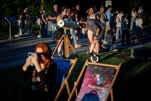 Partial solar eclipse in Czech Republic OSTRAVA, CZECH REPUBLIC - AUGUST 12: People use telescopes to observe a partial solar eclipse at an outdoor gathering in Ostrava, Czech Republic, on August 12, 2026. Lukas Kabon Anadolu Ostrava Czech Republic. Editorial use only. Please get in touch for any other usage.  Copyright: x2026xAnadoluxLukasxKabonx