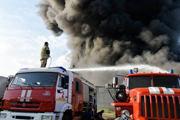 RUSSIA, KRASNODAR REGION - AUGUST 12, 2026: Smoke billows over a warehouse storing plastic products, hit by fire in the village of Lenina, southeast of Krasnodar. The fire covering an area of 2.2 thousand sq m has been contained. Roman Sokolov TASS  96070262