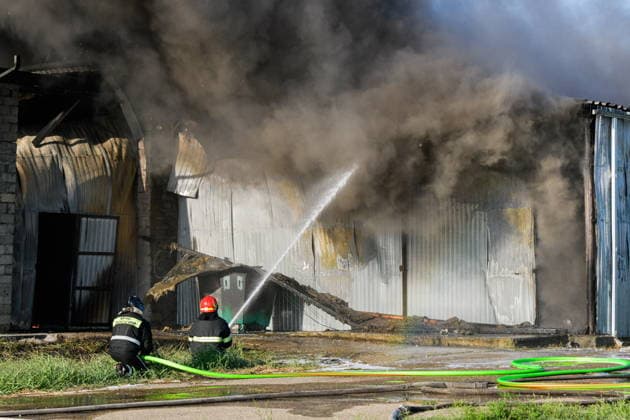 RUSSIA, KRASNODAR REGION - AUGUST 12, 2026: Employees of the Russian Emergencies Minsitry respond to a fire at a warehouse storing plastic products in the village of Lenina, southeast of Krasnodar. The fire covering an area of 2.2 thousand sq m has been contained. Roman Sokolov TASS  96070269