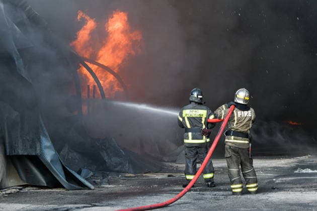 RUSSIA, KRASNODAR REGION - AUGUST 12, 2026: Employees of the Russian Emergencies Minsitry respond to a fire at a warehouse storing plastic products in the village of Lenina, southeast of Krasnodar. The fire covering an area of 2.2 thousand sq m has been contained Russia  - ZUMAt113 20260812_zaa_t113_364 Copyright: xRomanxSokolovx
