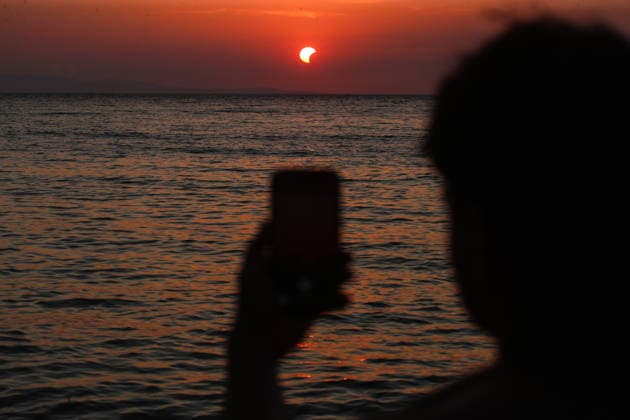 Solar eclipse in Croatia People watch the moon partially covers the sun during a solar eclipse in Vela Luka , Croatia, August 12, 2026  IgorxSoban PIXSELL