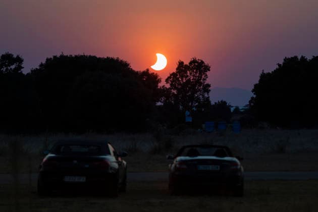 Sigüenza and Guadalajara Observe the 2026 Total Solar Eclipse Several people during the 2026 total solar eclipse, on August 12, 2026, in Sigüenza, Guadalajara, Castilla-La Mancha, Spain. This is the first total solar eclipse visible from the Iberian Peninsula in over a century. The path of totality crosses Spain from west to east and passes through numerous provincial capitals, from which observers will be able to catch a glimpse of the first phenomenon in the so-called trio of eclipses, since on August 2, 2027, another total eclipse will cross Spain, and on January 26, 2028, an annular eclipse will occur. AUGUST 12, 2026 SOLAR ECLIPSE TOTAL ECLIPSE PARTIAL MOON GLASSES Ananda Manjó Sigüenza, Guadalajara, Castile Sigüenza, Guadalajara, C  Copyright: xAnandaxManjonx 7711878