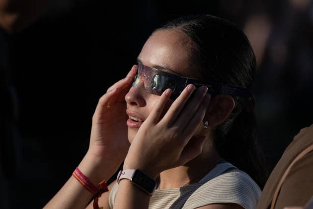 Partial Solar Eclipse observed in London LONDON, UNITED KINGDOM - AUGUST 12: People wearing special protective glasses and various viewing equipment watch the partial solar eclipse as the Moon passed between the Sun and Earth in London, United Kingdom on August 12, 2026. Rasid Necati Aslim Anadolu London United Kingdom. Editorial use only. Please get in touch for any other usage.  Copyright: x2026xAnadoluxRasidxNecatixAslimx
