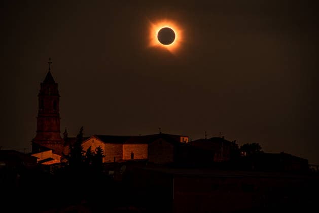 August 12, 2026, Llardecans, Lleida, Spain: A total solar eclipse is seen next to the village church bell tower in Llardecans, Lleida, Catalonia, Spain, on August 12, 2026. The rare celestial event is visible across parts of the world as the Moon passes directly between the Earth and the Sun, completely obscuring the Sun s disk during totality. Llardecans Spain - ZUMAb137 20260812_fap_b137_009 Copyright: xJordixBoixareux