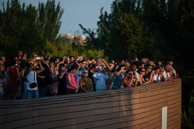 People gather in Zaragoza, Spain, to watch the total solar eclipse of August 12, 2026, as the Moon passes in front of the Sun and the city is briefly plunged into twilight Zaragoza Spain Copyright: xNanoxCalvox xVWPicsx NN-EclipseZaragoza-8