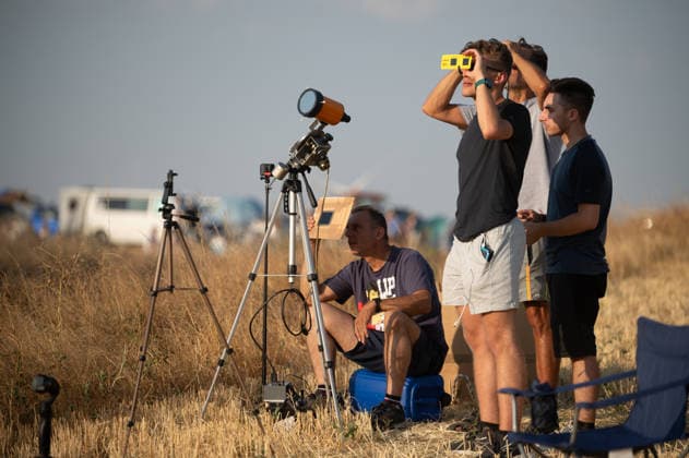 People watching the total solar eclipse from the Camino de Santiago near Burgos, Spain, on August 12, 2026. Pilgrims and visitors gather along the historic pilgrimage route as the Moon passes in front of the Sun during the rare total solar eclipse. Burgos was close to the centerline of the eclipse, with totality lasting approximately 1 minute and 45 seconds Kenai Spain Copyright: xEdwinxRemsbergx xVWPicsx ERE-SolarEclipseSpain-10
