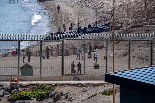 Morocco reinforces border security as migrants continue to leave Ceuta CEUTA, SPAIN AUGUST 12, 2026: Moroccan security forces reinforce measures on the Moroccan side of the Tarajal border area amid efforts to prevent further migrant crossings into the Spanish enclave of Ceuta on August 12, 2026. According to figures provided by Spain s Guardia Civil, migrants who entered Ceuta during the July 30 surge continue to leave voluntarily through a designated crossing point, with approximately 500 people departing the enclave over the previous 48 hours. Ceuta Spain Copyright: x xAntonioxSemperex xJNAxPressx
