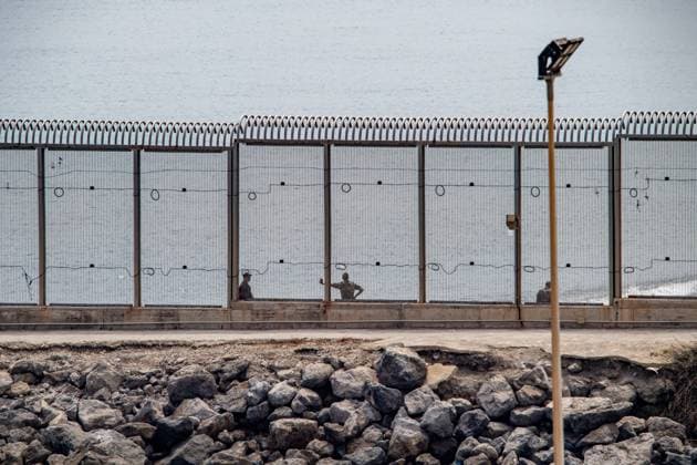 Morocco reinforces border security as migrants continue to leave Ceuta CEUTA, SPAIN AUGUST 12, 2026: Moroccan security forces reinforce measures on the Moroccan side of the Tarajal border area amid efforts to prevent further migrant crossings into the Spanish enclave of Ceuta on August 12, 2026. According to figures provided by Spain s Guardia Civil, migrants who entered Ceuta during the July 30 surge continue to leave voluntarily through a designated crossing point, with approximately 500 people departing the enclave over the previous 48 hours. Ceuta Spain Copyright: x xAntonioxSemperex xJNAxPressx
