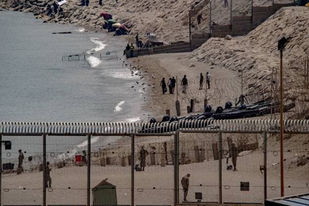 Morocco reinforces border security as migrants continue to leave Ceuta CEUTA, SPAIN AUGUST 12, 2026: Moroccan security forces reinforce measures on the Moroccan side of the Tarajal border area amid efforts to prevent further migrant crossings into the Spanish enclave of Ceuta on August 12, 2026. According to figures provided by Spain s Guardia Civil, migrants who entered Ceuta during the July 30 surge continue to leave voluntarily through a designated crossing point, with approximately 500 people departing the enclave over the previous 48 hours. Ceuta Spain Copyright: x xAntonioxSemperex xJNAxPressx