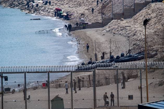 Morocco reinforces border security as migrants continue to leave Ceuta CEUTA, SPAIN AUGUST 12, 2026: Moroccan security forces reinforce measures on the Moroccan side of the Tarajal border area amid efforts to prevent further migrant crossings into the Spanish enclave of Ceuta on August 12, 2026. According to figures provided by Spain s Guardia Civil, migrants who entered Ceuta during the July 30 surge continue to leave voluntarily through a designated crossing point, with approximately 500 people departing the enclave over the previous 48 hours. Ceuta Spain Copyright: x xAntonioxSemperex xJNAxPressx