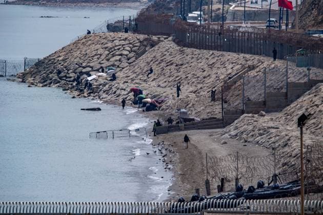 Morocco reinforces border security as migrants continue to leave Ceuta CEUTA, SPAIN AUGUST 12, 2026: Moroccan security forces reinforce measures on the Moroccan side of the Tarajal border area amid efforts to prevent further migrant crossings into the Spanish enclave of Ceuta on August 12, 2026. According to figures provided by Spain s Guardia Civil, migrants who entered Ceuta during the July 30 surge continue to leave voluntarily through a designated crossing point, with approximately 500 people departing the enclave over the previous 48 hours. Ceuta Spain Copyright: x xAntonioxSemperex xJNAxPressx