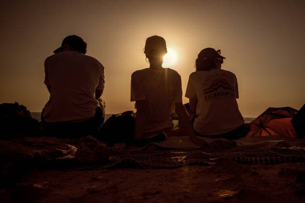 August 12, 2026, Ciutadella, Balearic Islands Menorca, Spain: People are silhouetted against the evening sky as they watch a total solar eclipse at Punta Nati on the Spanish Balearic island of Menorca Ciutadella Spain - ZUMAo105 20260812_fap_o105_002 Copyright: xMatthiasxOesterlex