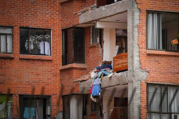 (260812) -- CALI, Aug. 12, 2026 -- This photo taken on Aug. 12, 2026 shows a damaged building in an earthquake in Cali, Colombia. The death toll from Monday s 7.4-magnitude earthquake in western Colombia has risen to 241, with 3,771 others injured, Colombian media reported Wednesday, citing figures from the National Unit for Disaster Risk Management. (Photo by Xinhua) COLOMBIA-CALI-EARTHQUAKE-AFTERMATH AndresxMoreno 