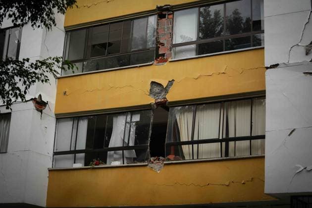 (260812) -- CALI, Aug. 12, 2026 -- This photo taken on Aug. 12, 2026 shows a damaged building in an earthquake in Cali, Colombia. The death toll from Monday s 7.4-magnitude earthquake in western Colombia has risen to 241, with 3,771 others injured, Colombian media reported Wednesday, citing figures from the National Unit for Disaster Risk Management. (Photo by Xinhua) COLOMBIA-CALI-EARTHQUAKE-AFTERMATH AndresxMoreno 