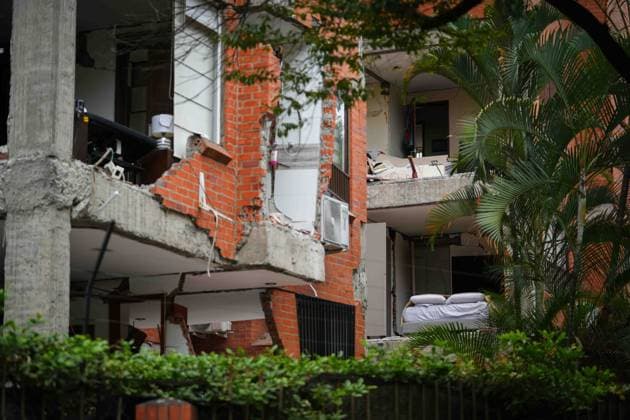 (260812) -- CALI, Aug. 12, 2026 -- This photo taken on Aug. 12, 2026 shows a damaged building in an earthquake in Cali, Colombia. The death toll from Monday s 7.4-magnitude earthquake in western Colombia has risen to 241, with 3,771 others injured, Colombian media reported Wednesday, citing figures from the National Unit for Disaster Risk Management. (Photo by Xinhua) COLOMBIA-CALI-EARTHQUAKE-AFTERMATH AndresxMoreno 