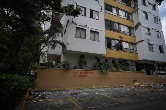 (260812) -- CALI, Aug. 12, 2026 -- This photo taken on Aug. 12, 2026 shows a damaged building in an earthquake in Cali, Colombia. The death toll from Monday s 7.4-magnitude earthquake in western Colombia has risen to 241, with 3,771 others injured, Colombian media reported Wednesday, citing figures from the National Unit for Disaster Risk Management. (Photo by Xinhua) COLOMBIA-CALI-EARTHQUAKE-AFTERMATH AndresxMoreno 