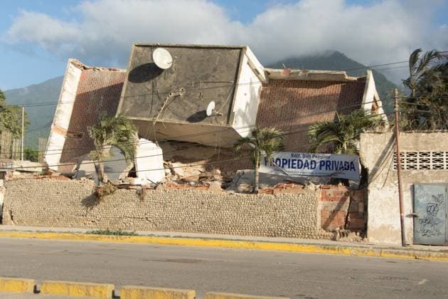 Recovery Efforts Continue in Earthquake-Ravaged La Guaira LA GUAIRA, VENEZUELA AUGUST 12, 2026: Residents continue moving through earthquake-damaged neighborhoods in Tanaguarena, Los Corales and Catia La Mar, where destroyed roads, collapsed buildings and debris continue to disrupt daily life 49 days after the twin earthquakes struck Venezuela s central coast. With public transportation limited, residents walk through rubble and around heavy machinery to reach different parts of the affected areas, while many continue searching for drinking water as recovery and debris removal operations remain underway. Estado la guaira Venezuela (Bolivarian Republic of) Copyright: x xFranyerxNievesx(Babel)x xJNAxPressx
