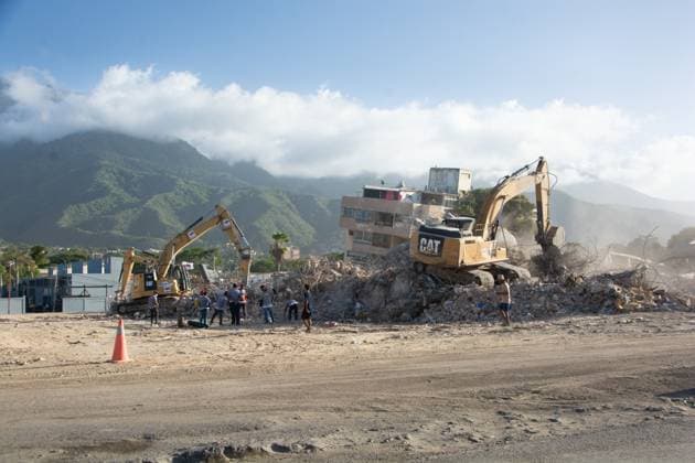 Recovery Efforts Continue in Earthquake-Ravaged La Guaira LA GUAIRA, VENEZUELA AUGUST 12, 2026: Residents continue moving through earthquake-damaged neighborhoods in Tanaguarena, Los Corales and Catia La Mar, where destroyed roads, collapsed buildings and debris continue to disrupt daily life 49 days after the twin earthquakes struck Venezuela s central coast. With public transportation limited, residents walk through rubble and around heavy machinery to reach different parts of the affected areas, while many continue searching for drinking water as recovery and debris removal operations remain underway. Estado la guaira Venezuela (Bolivarian Republic of) Copyright: x xFranyerxNievesx(Babel)x xJNAxPressx