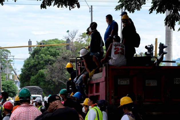 August 12, 2026, Cali, Valle Del Cauca, Colombia: People gather outside collapsed buildings in Cali, Colombia on August 12, 2026 to aid in several rescue labors after a 7,4 magnitude earthquake that struck the cities of Quibdo, Cali, Pereira and Manizales leaving more than 200 casualties past august 10. Cali Colombia - ZUMAvp1_ 20260812_zia_vp1_003 Copyright: xMartinxStevenxAngelx