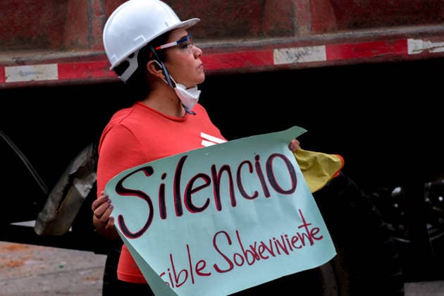 August 12, 2026, Cali, Valle Del Cauca, Colombia: People gather outside collapsed buildings in Cali, Colombia on August 12, 2026 to aid in several rescue labors after a 7,4 magnitude earthquake that struck the cities of Quibdo, Cali, Pereira and Manizales leaving more than 200 casualties past august 10. Cali Colombia - ZUMAvp1_ 20260812_zia_vp1_015 Copyright: xMartinxStevenxAngelx