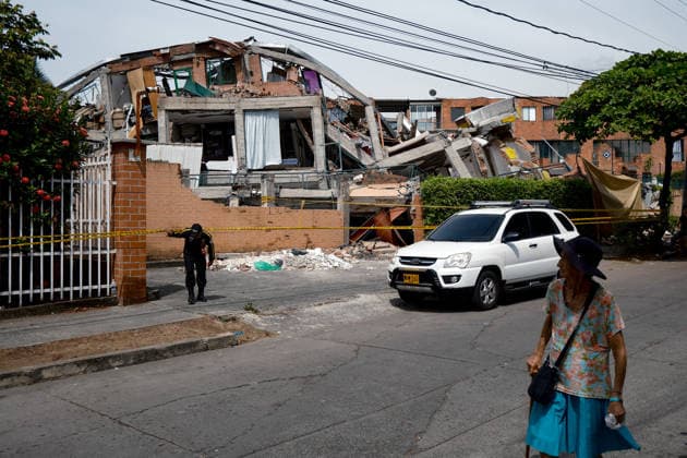 August 12, 2026, Cali, Valle Del Cauca, Colombia: People gather outside collapsed buildings in Cali, Colombia on August 12, 2026 to aid in several rescue labors after a 7,4 magnitude earthquake that struck the cities of Quibdo, Cali, Pereira and Manizales leaving more than 200 casualties past august 10. Cali Colombia - ZUMAvp1_ 20260812_zia_vp1_041 Copyright: xMartinxStevenxAngelx