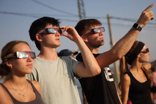 RECORD DATE NOT STATED Total Solar Eclipse In Ariza, Spain. People wearing special sunglasses watch total solar eclipse at Castillo de Ariza hill in Ariza, Spain on August 12th, 2026. Ariza experienced a total 100% sun coverage. Ariza Spain  Copyright: xBeataxZawrzelx originalFilename: zawrzel-notitle260813_nphnF.jpg