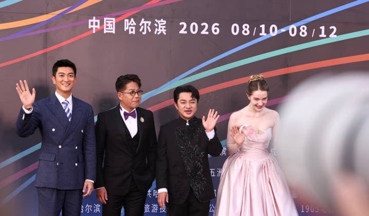 HARBIN, CHINA - AUGUST 12: Wong Cho-lam and Du Jiang attend the red carpet ceremony for the closing of the 7th Jackie Chan International Action Film Week at Harbin Ice-Snow World on August 12, 2026 in Harbin, Heilongjiang Province of China. The event gathered hundreds of filmmakers to celebrate achievements in action cinema.  Copyright: xVCGx 111659586568