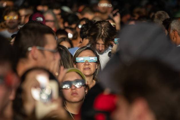 Solar Eclipse in Madrid, Spain - 12 Aug 2026 A person wearing eclipse glasses observes the solar eclipse in Madrid. Madrid Spain Copyright: xDavidxCanalesx xSOPAxImagesx David-Canales-1441809