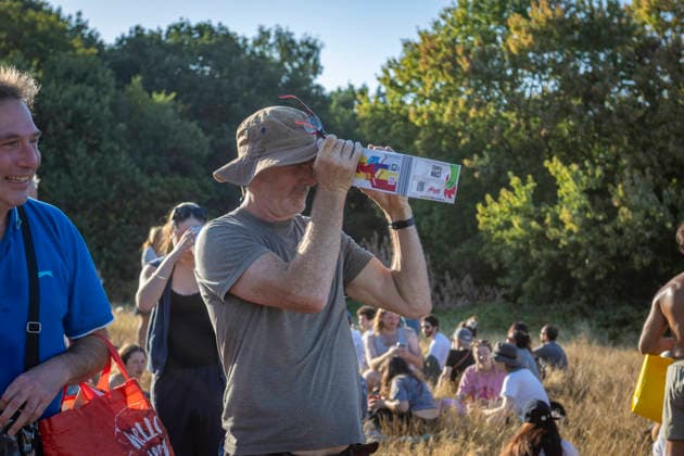 Solar Eclipse Over Hampstead Heath London, 2026 Visitors gathered at Hampstead Heath in North London to watch the solar eclipse. The eclipse was visible across the London skyline, with spectators looking towards the sky and capturing the event on cameras and phones., Credit:Zak Irfan Avalon  Copyright: xZakxIrfanx xAvalonx 1122596950