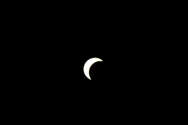 Solar Eclipse Over Hampstead Heath London, 2026 Visitors gathered at Hampstead Heath in North London to watch the solar eclipse. The eclipse was visible across the London skyline, with spectators looking towards the sky and capturing the event on cameras and phones., Credit:Zak Irfan Avalon  Copyright: xZakxIrfanx xAvalonx 1122597015