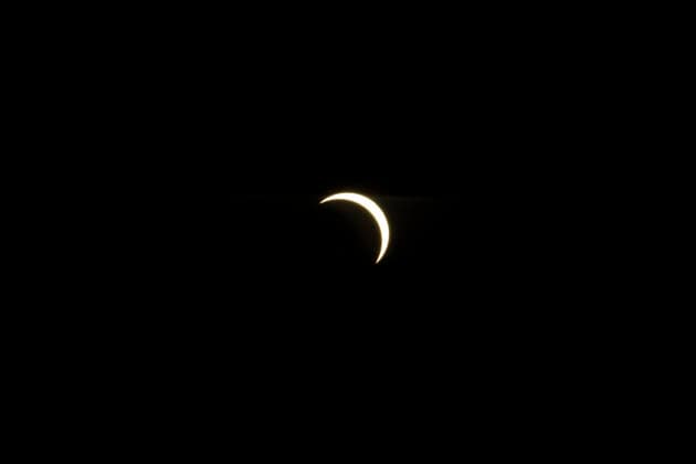 Solar Eclipse Over Hampstead Heath London, 2026 Visitors gathered at Hampstead Heath in North London to watch the solar eclipse. The eclipse was visible across the London skyline, with spectators looking towards the sky and capturing the event on cameras and phones., Credit:Zak Irfan Avalon  Copyright: xZakxIrfanx xAvalonx 1122597058