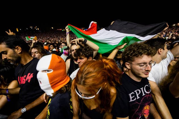 August 13, 2026, Paredes De Coura, Portugal: Fans with a Palestine flag seen during the Irish hip?hop trio, Kneecap concert at Vodafone Paredes de Coura. Paredes De Coura Portugal - ZUMAs197 20260813_aaa_s197_018 Copyright: xDiogoxBaptistax