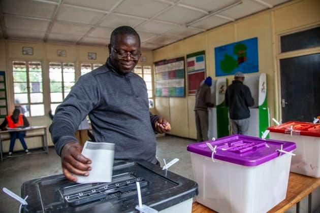 (260813) -- LUSAKA, Aug. 13, 2026 -- A voter casts his ballot at a polling station in Lusaka, Zambia, on Aug. 13, 2026. Zambia held general elections on Thursday, with about 8.7 million registered voters casting ballots for president, National Assembly members and local representatives. (Photo by Xinhua) ZAMBIA-GENERAL ELECTIONS-VOTING MartinxMbangweta 