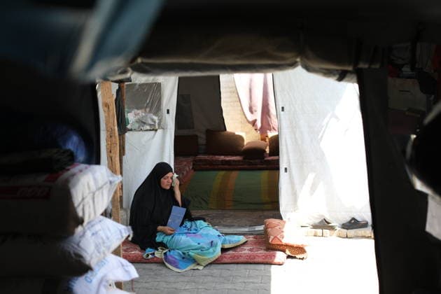 Displaced Palestinian Families Endure Summer Heat in Nuseirat Displaced Palestinian families live in tents in Nuseirat refugee camp in the central Gaza Strip, on August 13, 2026, as they struggle to cope with high temperatures and summer heat amid difficult living conditions. Photo by Hassan al-Jedi apaimages Nusairat Gaza Strip Palestinian Territory 130826_Nuseirat_HJ_00(13).jpeg Copyright: xapaimagesxHassanxal-Jedixx xapaimagesx