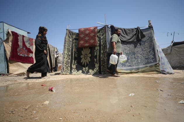 Displaced Palestinian Families Endure Summer Heat in Nuseirat Displaced Palestinian families live in tents in Nuseirat refugee camp in the central Gaza Strip, on August 13, 2026, as they struggle to cope with high temperatures and summer heat amid difficult living conditions. Photo by Hassan al-Jedi apaimages Nusairat Gaza Strip Palestinian Territory 130826_Nuseirat_HJ_00(22).jpeg Copyright: xapaimagesxHassanxal-Jedixx xapaimagesx