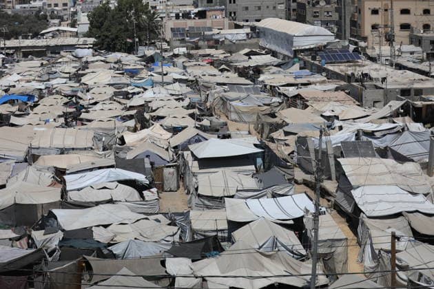 Displaced Palestinian Families Endure Summer Heat in Nuseirat Displaced Palestinian families live in tents in Nuseirat refugee camp in the central Gaza Strip, on August 13, 2026, as they struggle to cope with high temperatures and summer heat amid difficult living conditions. Photo by Hassan al-Jedi apaimages Nusairat Gaza Strip Palestinian Territory 130826_Nuseirat_HJ_00(3).jpeg Copyright: xapaimagesxHassanxal-Jedixx xapaimagesx