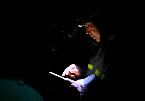 (260813) -- LUOHE, Aug. 13, 2026 -- A staff member verifies a list of evacuated residents in Beiwudu Town of Wuyang County, Luohe, central China s Henan Province, Aug. 13, 2026. Thousands of people have been evacuated in central China s Henan Province after days of torrential rain swelled rivers and triggered a levee breach, local authorities said Thursday. In Luohe City, more than 4,500 people from 10 villages were evacuated amid rising concerns over potential river flooding. From Monday afternoon to Wednesday afternoon, the city recorded an average rainfall of 270.1 millimeters, with a peak of 434.2 millimeters, prompting authorities to activate the highest-level flood control emergency response. ) CHINA-HENAN-LUOHE-TYPHOON DOLPHIN-D 